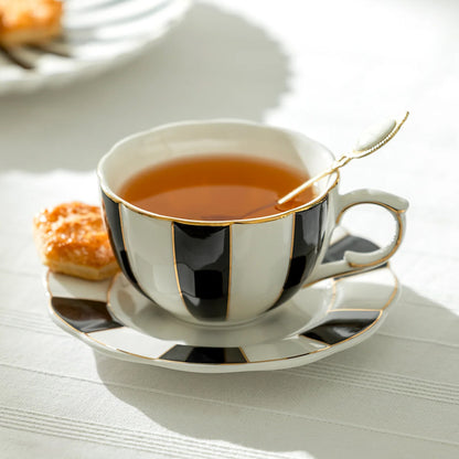 Black and White Striped Scallop Porcelain Tea Cup and Saucer with Gold Trim